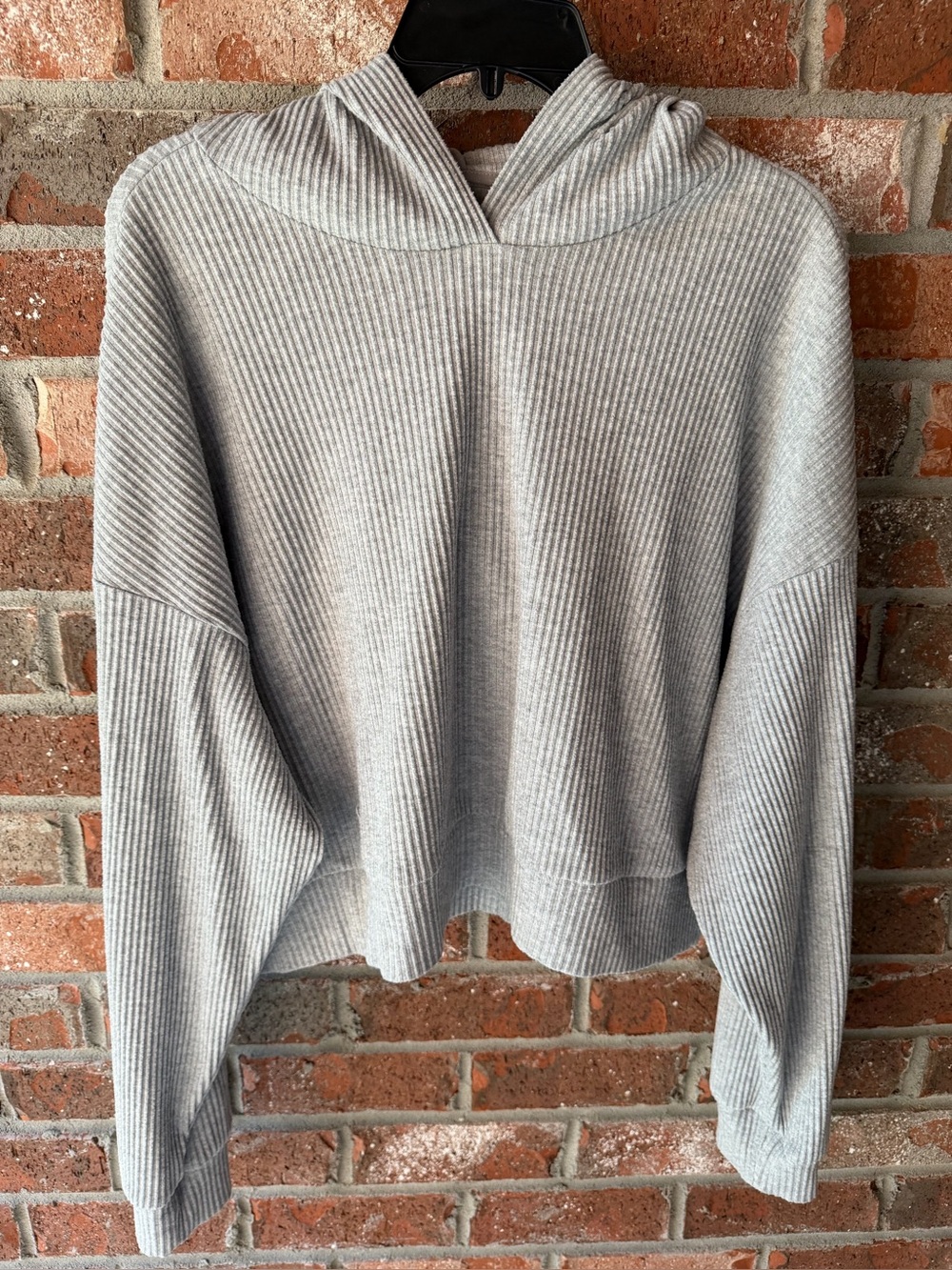 Alo Yoga Muse Hoodie in the color Athletic Heather Grey. Size large